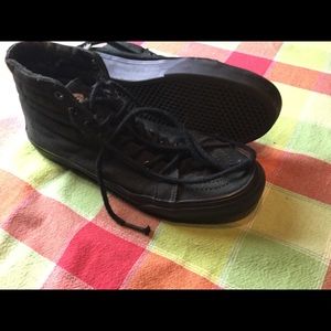 All black hightop vans